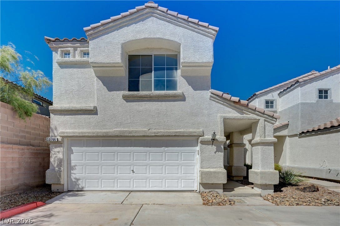 2706 Guidance Court, North Las Vegas, NV 89031 Spanish tile accents and textured stucco define this classic multi-level residence with an attached garage.
