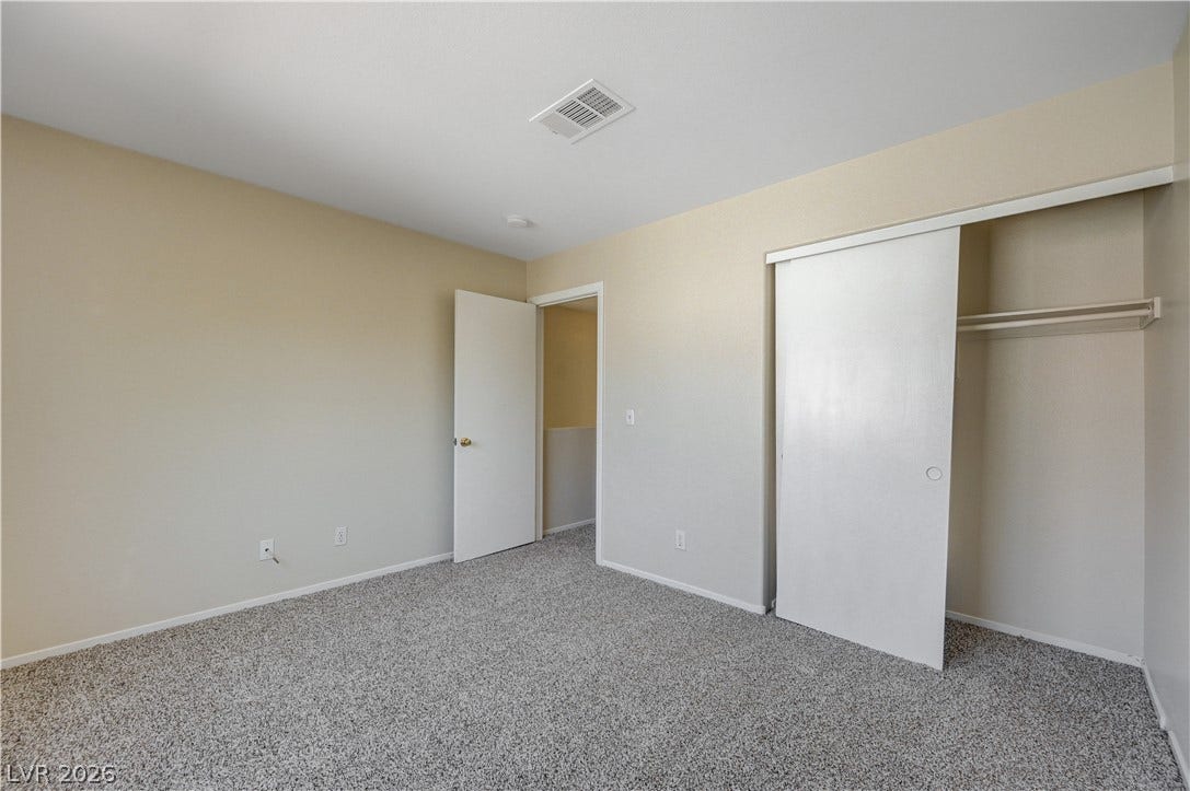 2706 Guidance Court, North Las Vegas, NV 89031 Plush wall-to-wall carpeting and a wide closet define this comfortable secondary bedroom.