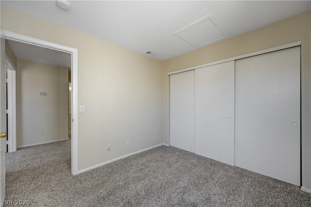 2706 Guidance Court, North Las Vegas, NV 89031 Plush carpeting and an expansive sliding-door closet complete this versatile bedroom.