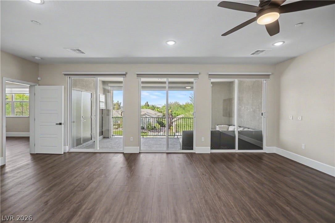 2555 Hampton Road, #11210, Henderson, NV 89052 Set up your dining table and sofa with room to spare. This versatile room flows right out the the covered balcony.