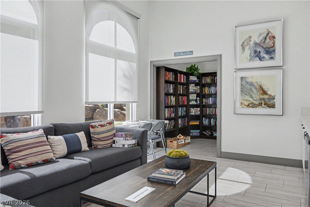 2555 Hampton Road, #11210, Henderson, NV 89052 Curl up with a good book in the community lounge, featuring cozy seating, a charming library nook stocked with books and games.