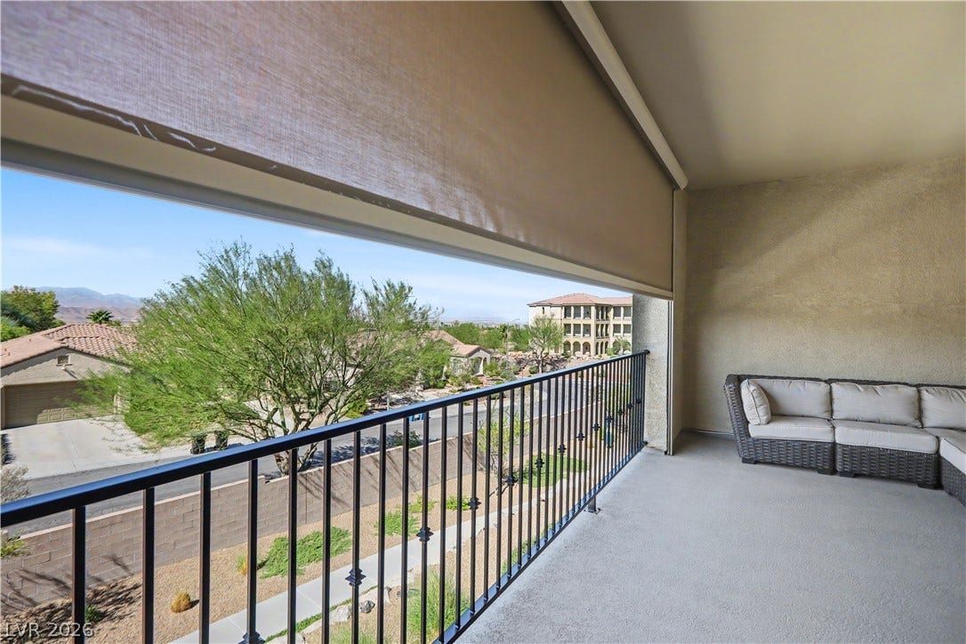 2555 Hampton Road, #11210, Henderson, NV 89052 Enjoy the balcony year-round with a motorized retractable sun screen that adds shade, comfort, and privacy whenever you need it.