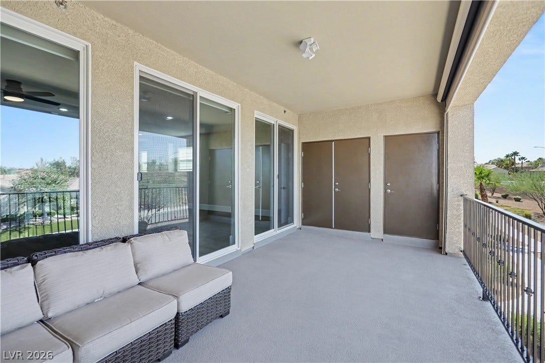 2555 Hampton Road, #11210, Henderson, NV 89052 Extra storage is built right in! Behind the double doors you will find shelving for outdoor gear and seasonal items and the tankless water heater, for endless hot water, is tucked neatly in the closet to the right.