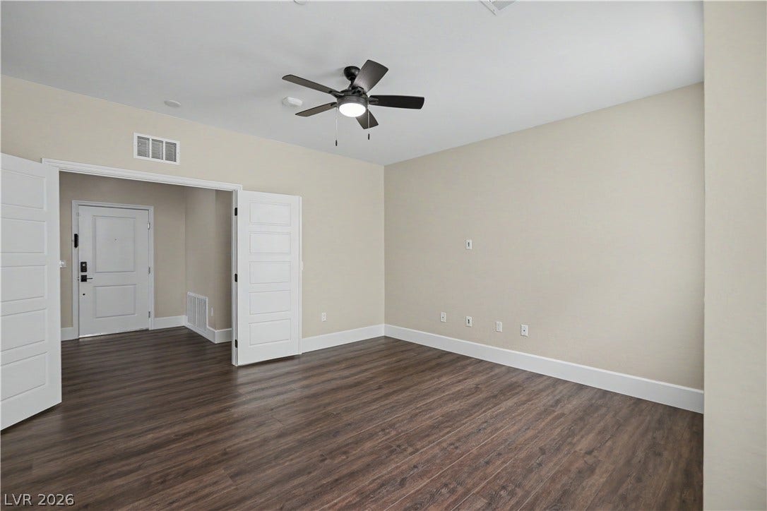 2555 Hampton Road, #11210, Henderson, NV 89052 Work from home in style. Thus spacious den features French doors, a ceiling fan and wood inspired LVP flooring.