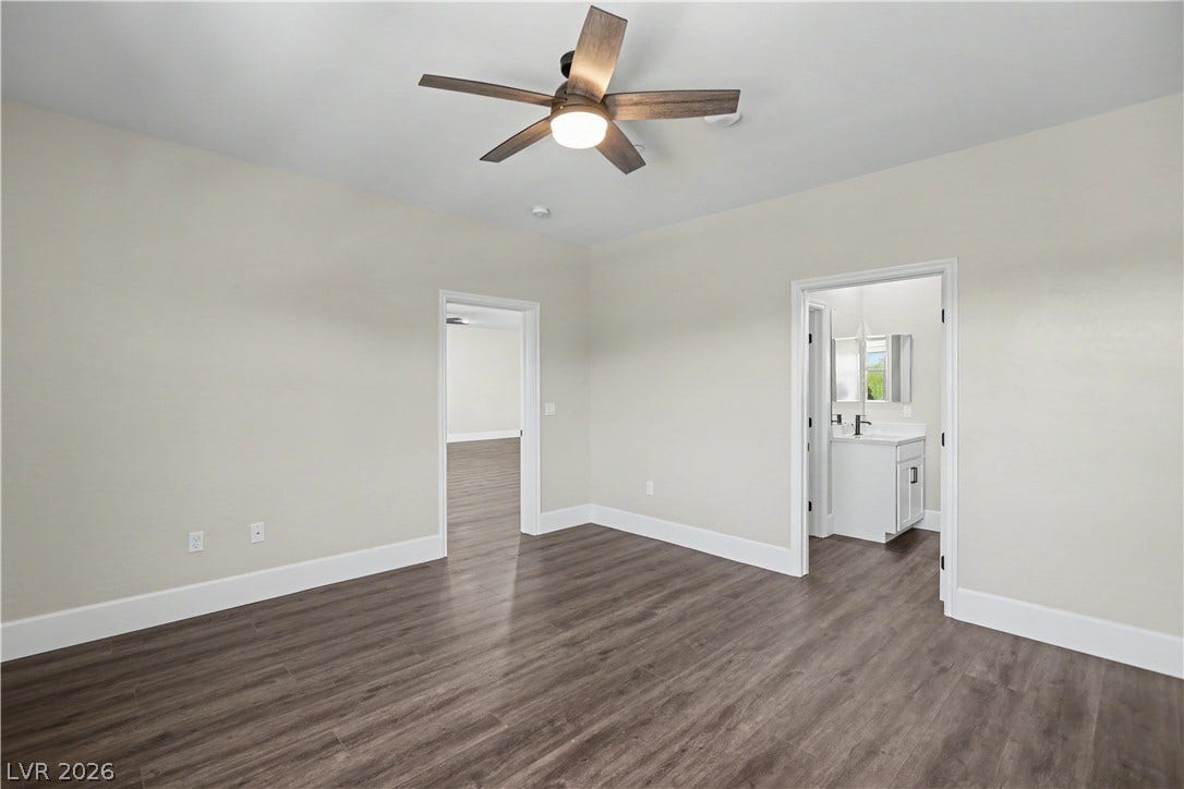 2555 Hampton Road, #11210, Henderson, NV 89052 The second bedroom includes its own private en suite bathroom, perfect for guests or family members who want a little extra privacy.