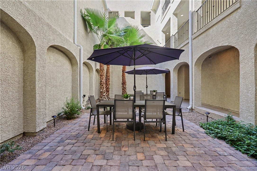 2555 Hampton Road, #11210, Henderson, NV 89052 Get to know your neighbors in this charming shared courtyard, with paver patio, palm trees, and shaded seating in the middle of each condo bullding.