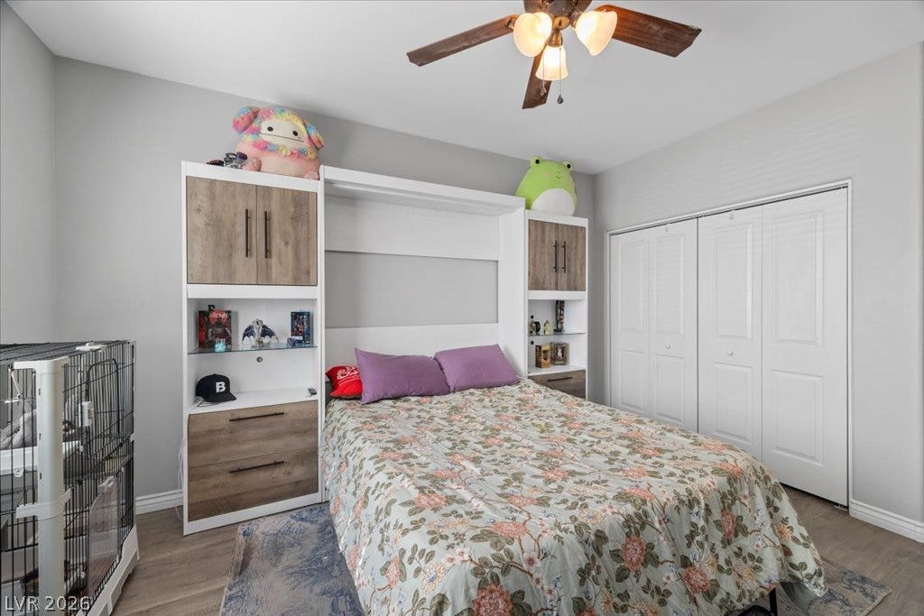2386 Flute Avenue, Henderson, NV 89052 Clean lines and durable wood laminate floors define this versatile space.