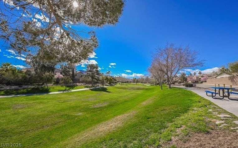 2386 Flute Avenue, Henderson, NV 89052 Manicured green space with paved walking paths offers a serene neighborhood setting.
