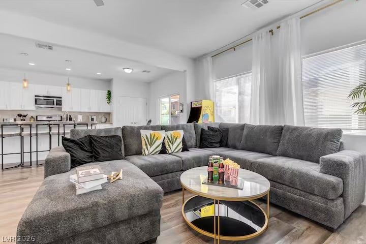 2713 Concord Street, North Las Vegas, NV 89030 An open floor plan seamlessly connects the living space to the adjacent kitchen area.