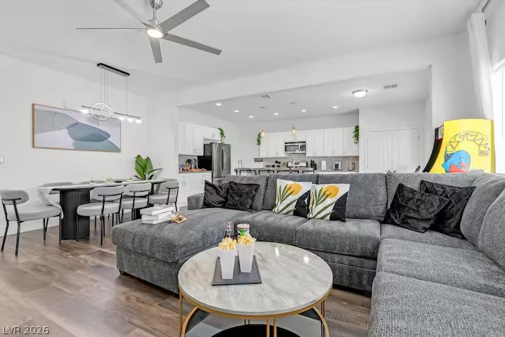 2713 Concord Street, North Las Vegas, NV 89030 An open floorplan seamlessly connects the bright dining area to the modern kitchen.