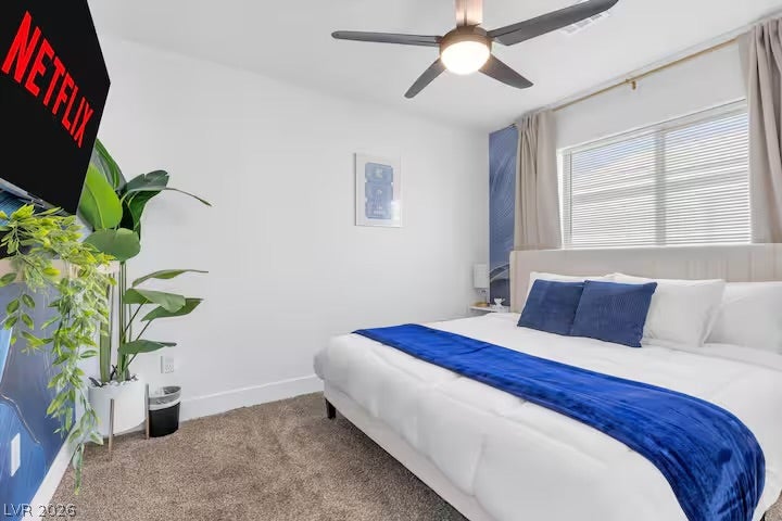 2713 Concord Street, North Las Vegas, NV 89030 Soft carpeting underfoot and a wide window create a comfortable, inviting retreat.