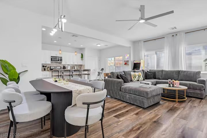 2713 Concord Street, North Las Vegas, NV 89030 An airy open concept layout integrates the main living and dining spaces over wood floors.