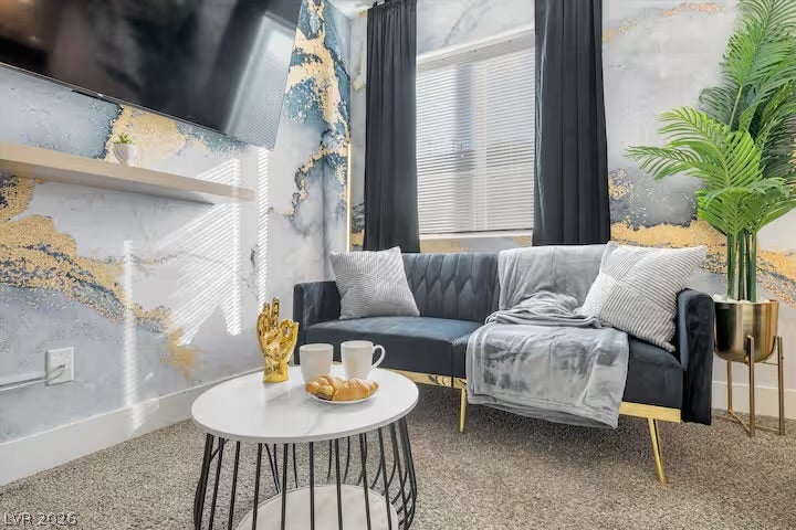2713 Concord Street, North Las Vegas, NV 89030 Plush wall-to-wall carpeting and a wide window define this cozy seating alcove.