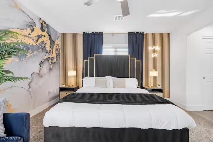 2713 Concord Street, North Las Vegas, NV 89030 Plush carpet pairs with clean architectural lines in this comfortable sleeping space.