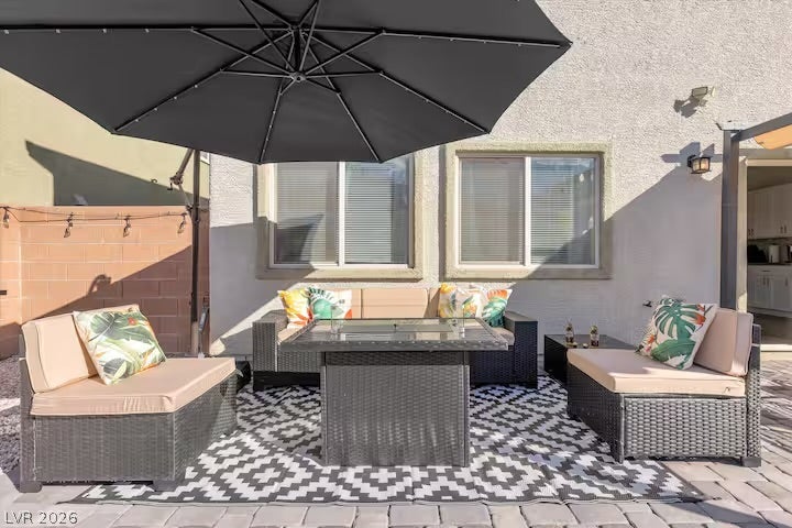 2713 Concord Street, North Las Vegas, NV 89030 An inviting outdoor patio space paved in stone connects directly to the home exterior.