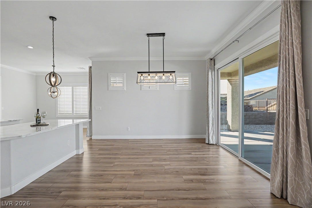 2073 Fountain City Street, Henderson, NV 89052 This bright dining space sits right off the kitchen, with easy access to the backyard for indoor-outdoor entertaining.