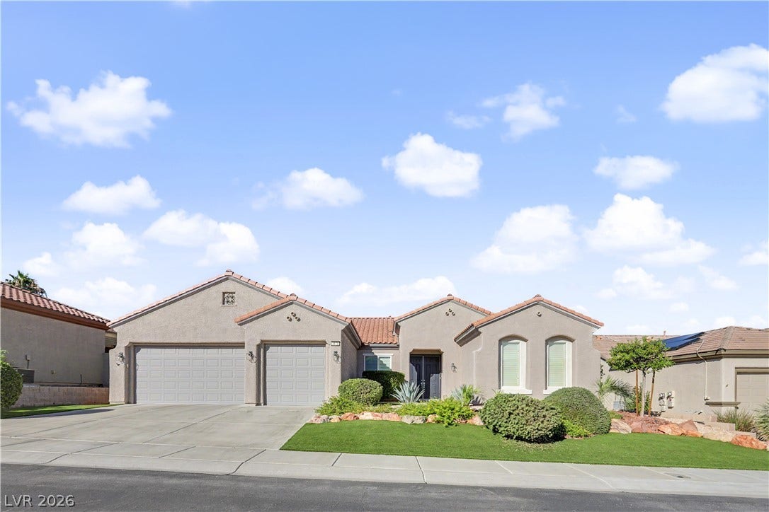 2073 Fountain City Street, Henderson, NV 89052 This home makes a great first impression, with arched windows, tile roof and lush easy-care landscaping.