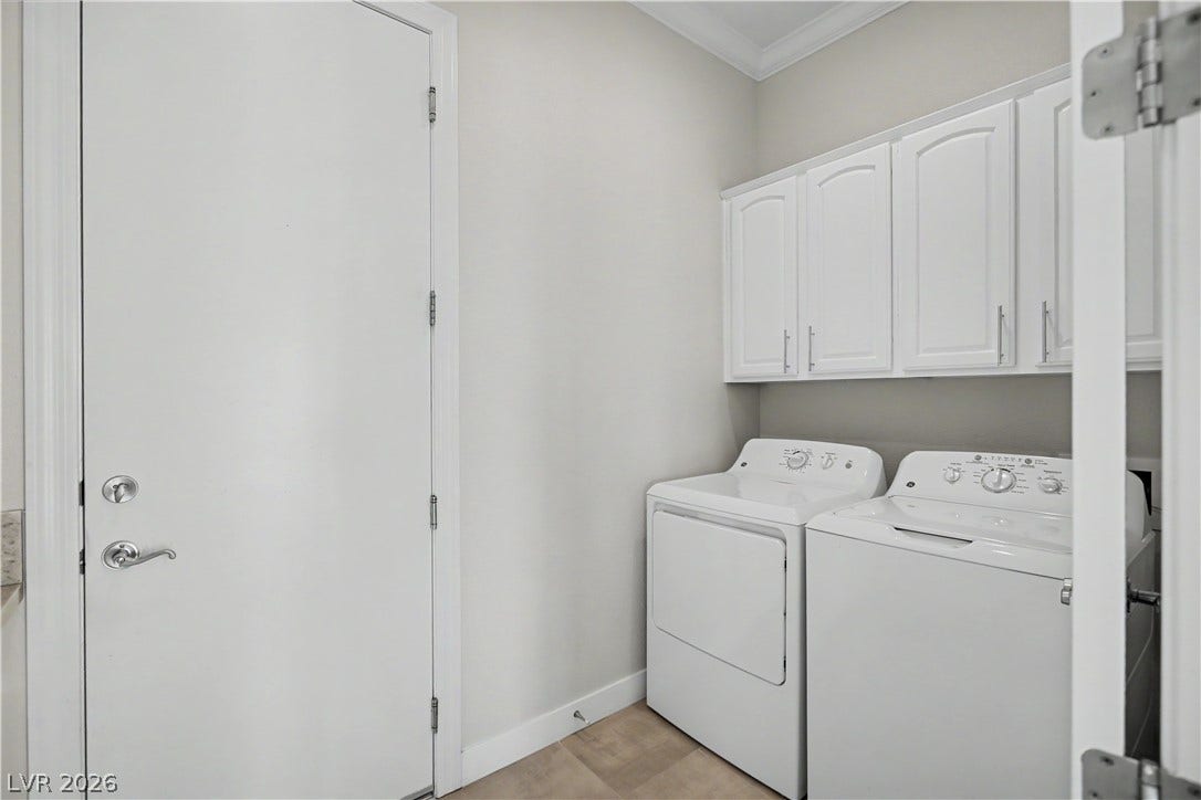 2073 Fountain City Street, Henderson, NV 89052 The separate laundry room offers upper cabinets for storage, crown molding and the washer and dryer will convey will the sale of the home.