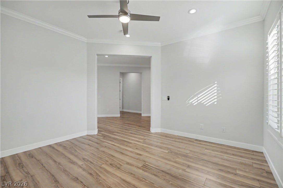 2073 Fountain City Street, Henderson, NV 89052 The den's open entry and convenient location just off the foyer make it ideal for a home office or for greeting guests.