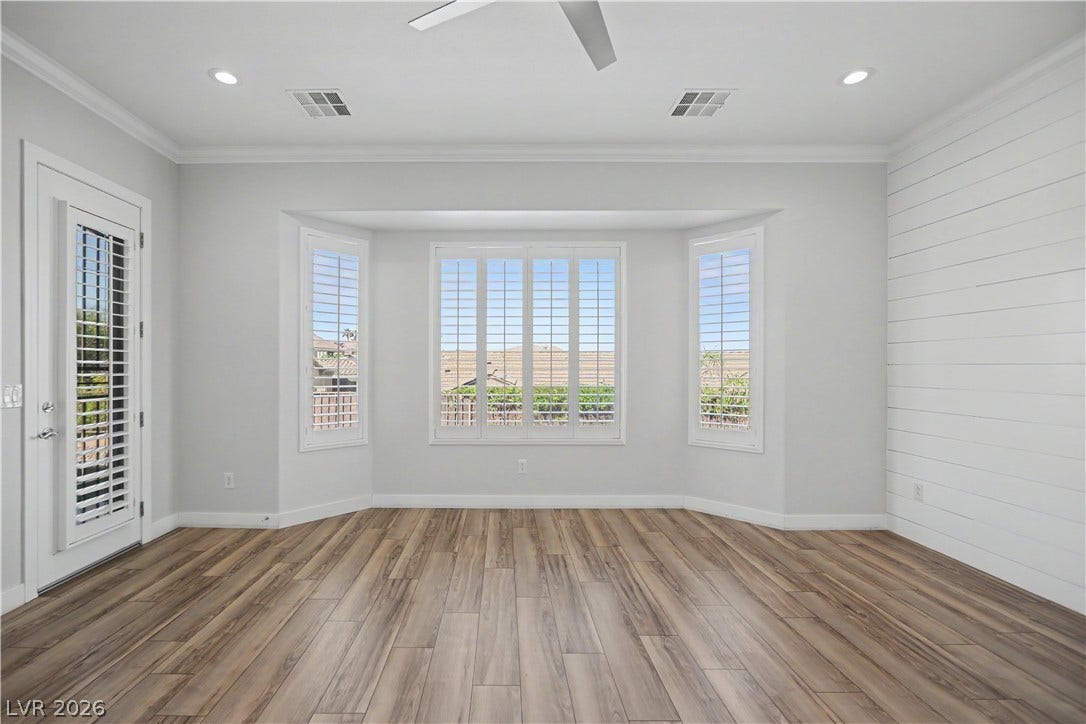 2073 Fountain City Street, Henderson, NV 89052 The primary suite has its own private door to the backyard, perfect for morning coffee or a glass of wine at sunset.
