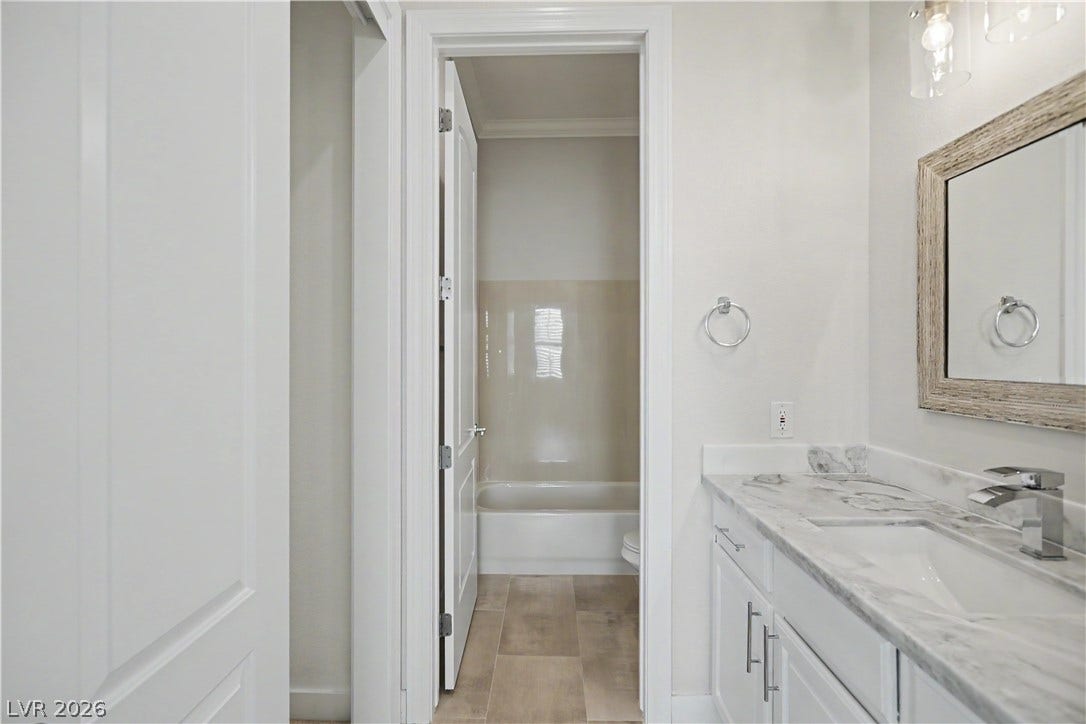 2073 Fountain City Street, Henderson, NV 89052 A separate tub and toilet room sits behind its own door, so the vanity area stays open for getting ready while someone else showers.
