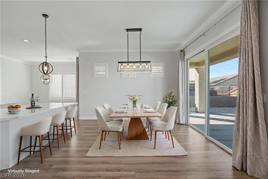 2073 Fountain City Street, Henderson, NV 89052 Host family and friends in this inviting dining area, where the patio is just steps away for after-dinner drinks under the stars.