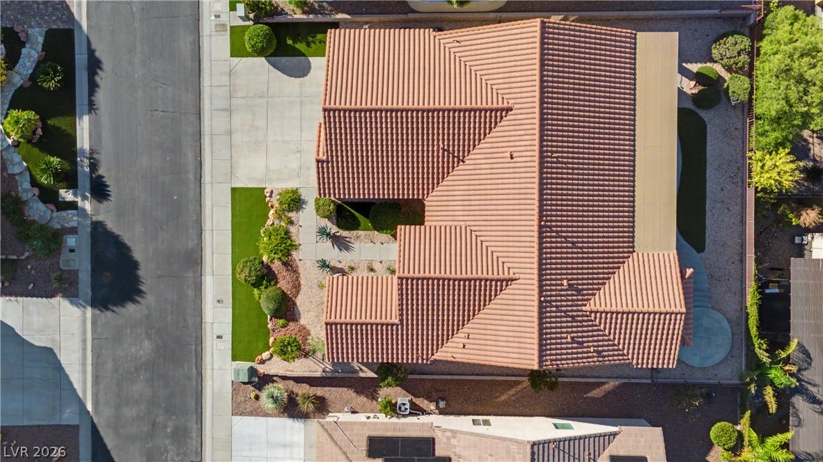 2073 Fountain City Street, Henderson, NV 89052 This overhead view highlights the home's generous footprint, manicured curb appeal and private backyard retreat.