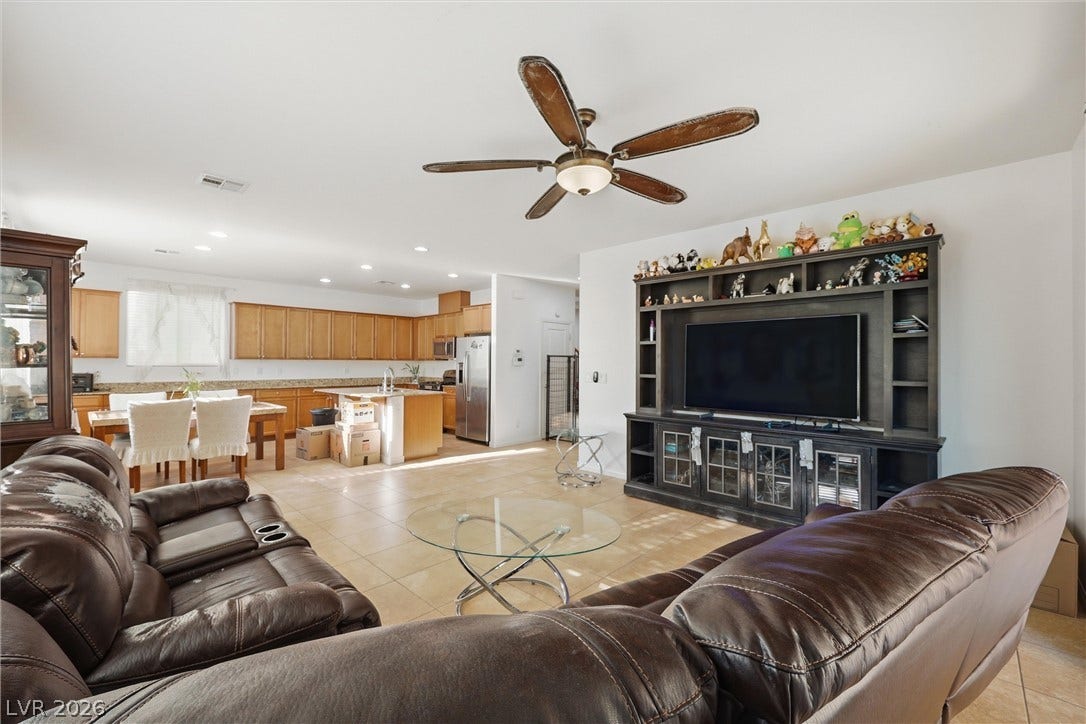 7057 Millers Run Street, North Las Vegas, NV 89084 An open floorplan design seamlessly connects the casual living area to the adjacent kitchen.