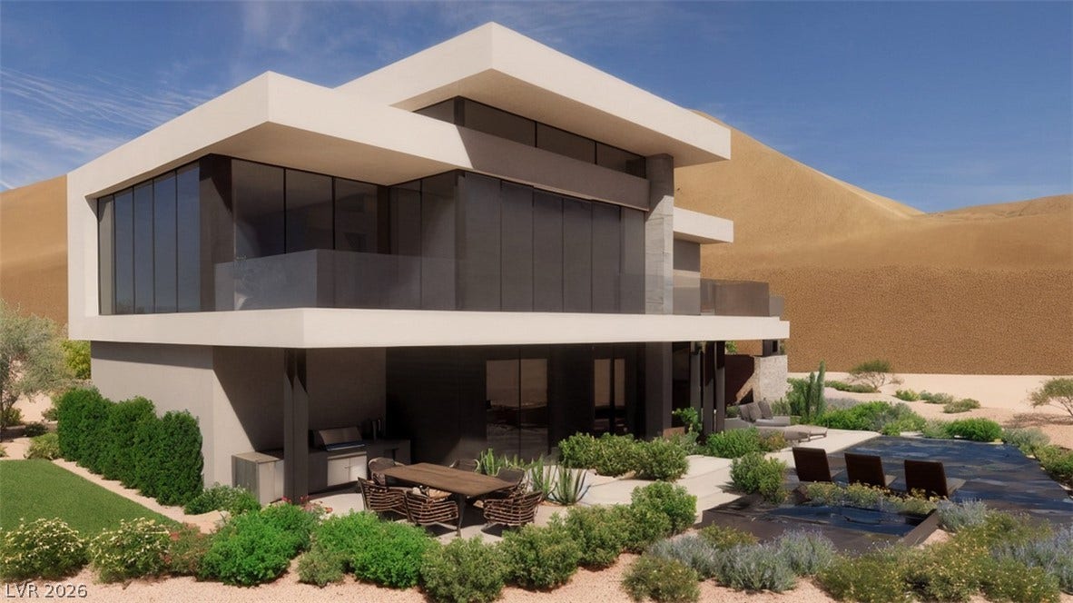 7 Chisel Crest Court, Henderson, NV 89012 Bold geometric lines and extensive floor-to-ceiling glass define this modern desert residence.