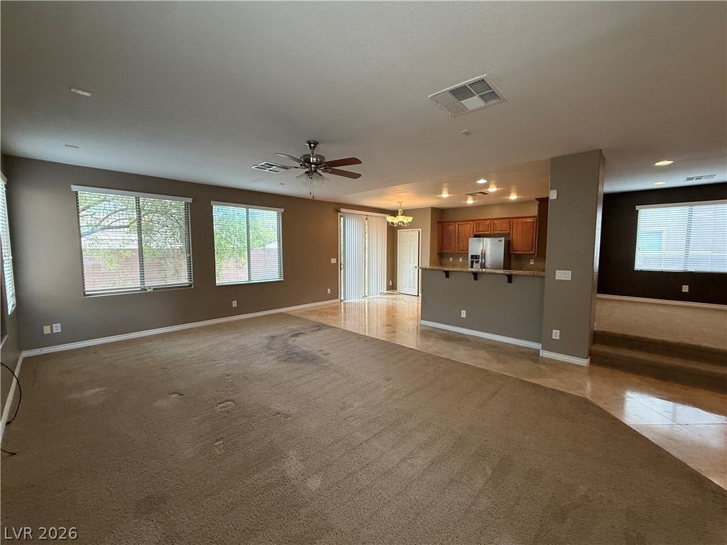 5904 Gold Horizon Street, North Las Vegas, NV 89031 An open layout connects the spacious living room directly to the kitchen area.