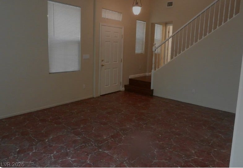 4421 Oberlander Avenue, North Las Vegas, NV 89031 Gleaming tile floors and a soaring ceiling define this welcoming entryway.