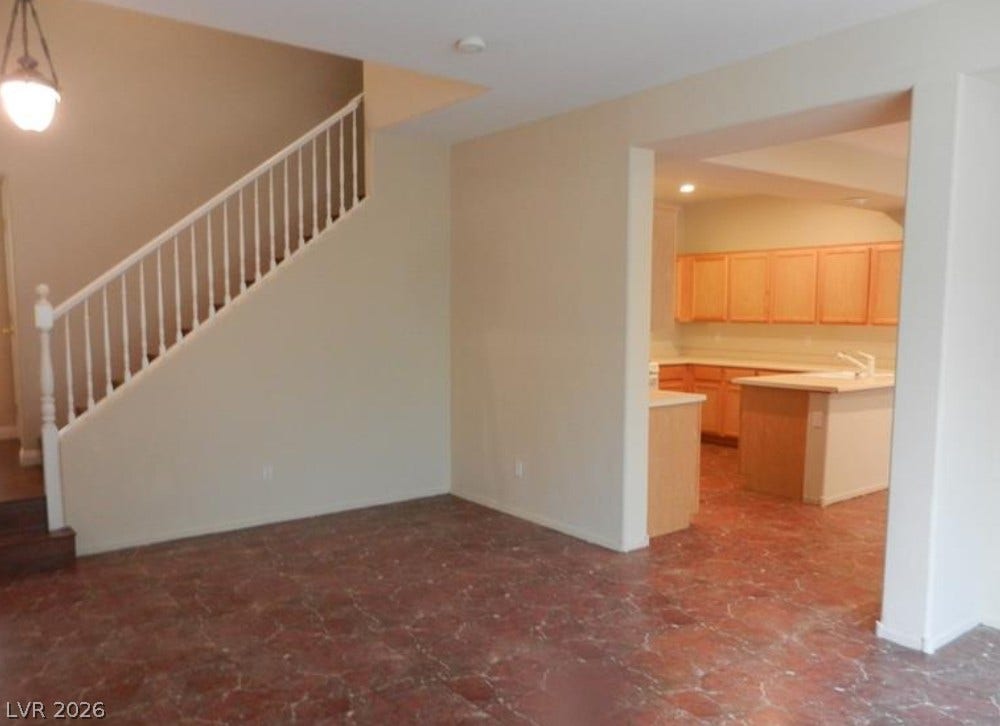 4421 Oberlander Avenue, North Las Vegas, NV 89031 An open layout connects the entryway and staircase directly to the spacious kitchen.