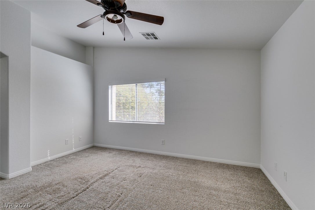 3612 Indigo Flower Street, #2, North Las Vegas, NV 89084 High ceilings and clean lines define this versatile secondary bedroom space.
