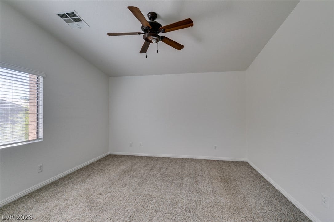 3612 Indigo Flower Street, #2, North Las Vegas, NV 89084 Plush carpeting and a large window set a comfortable tone in this versatile bedroom.