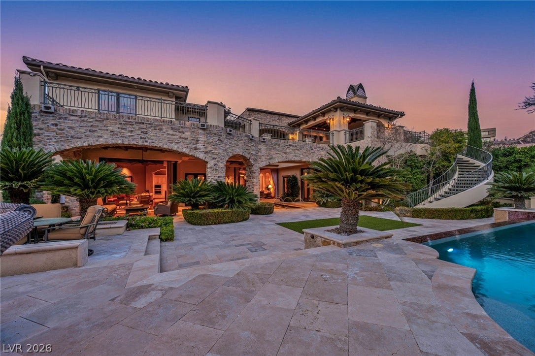 1793 Anelli Court, Henderson, NV 89012 Stone arches and expansive stone terraces create a dramatic backdrop for the pool and gardens.