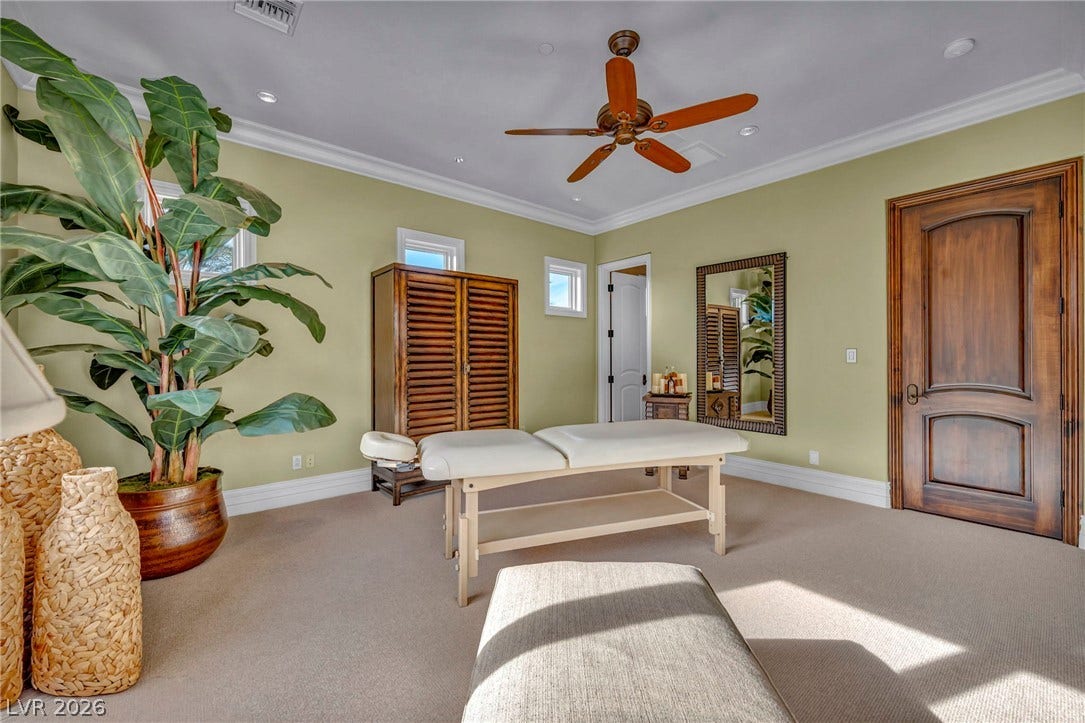 1793 Anelli Court, Henderson, NV 89012 Crown molding and rich wood doors elevate this versatile flex space.