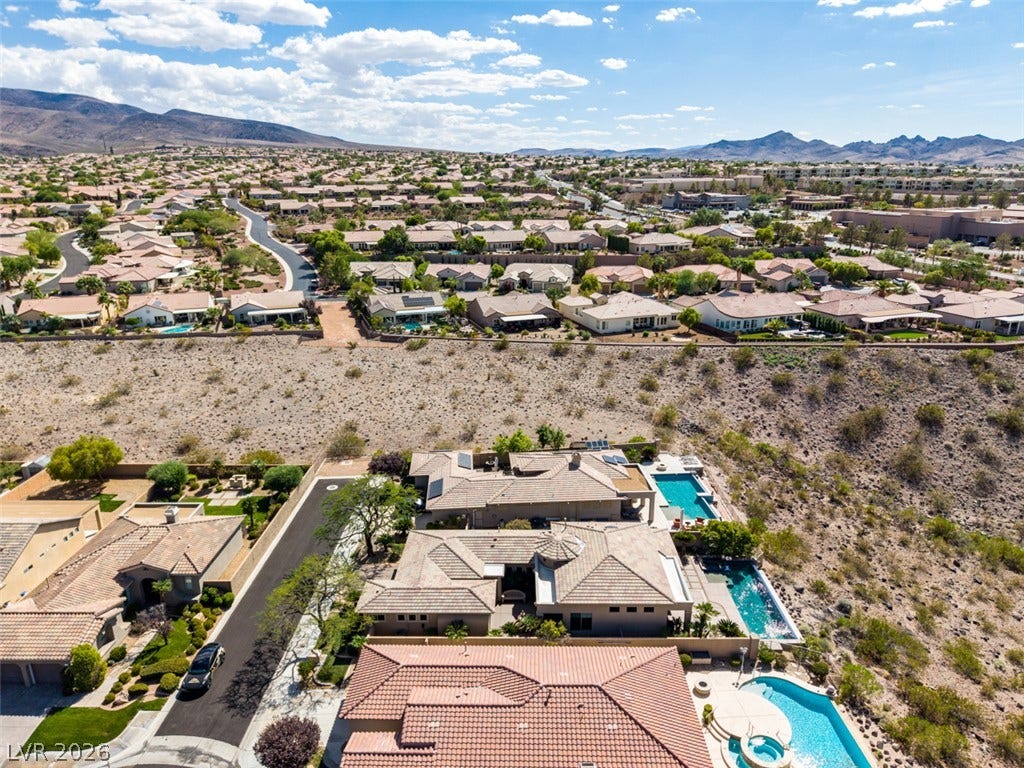 51 E Braelinn Drive, Henderson, NV 89052 Panoramic neighborhood vistas unfold from this elevated hillside vantage point under clear desert skies.