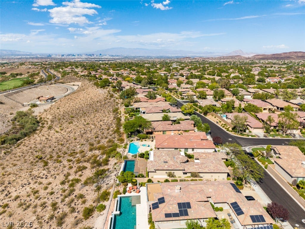 51 E Braelinn Drive, Henderson, NV 89052 Scenic hillsides and distant city views frame this tranquil suburban neighborhood.