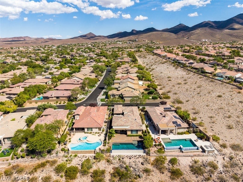 51 E Braelinn Drive, Henderson, NV 89052 Panoramic mountain and neighborhood vistas surround this beautifully situated desert community.