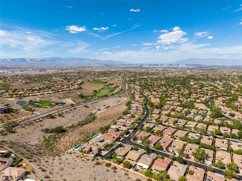 51 E Braelinn Drive, Henderson, NV 89052 Panoramic mountain and valley vistas stretch across the horizon from this elevated desert neighborhood.