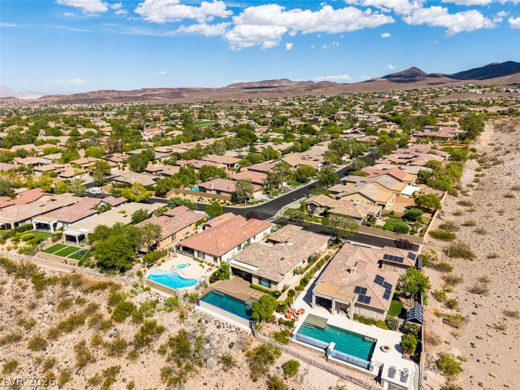 51 E Braelinn Drive, Henderson, NV 89052 Sweeping mountain vistas frame this desert neighborhood featuring homes with private swimming pools.