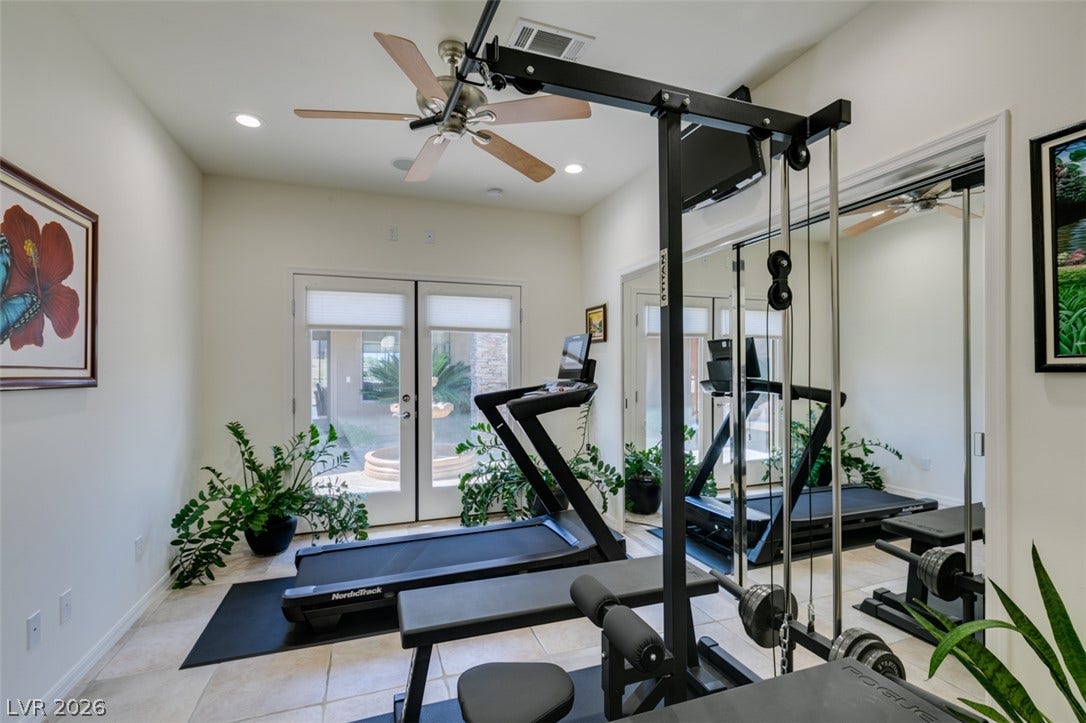 51 E Braelinn Drive, Henderson, NV 89052 French doors open to the outdoors in this bright space with durable tile flooring.