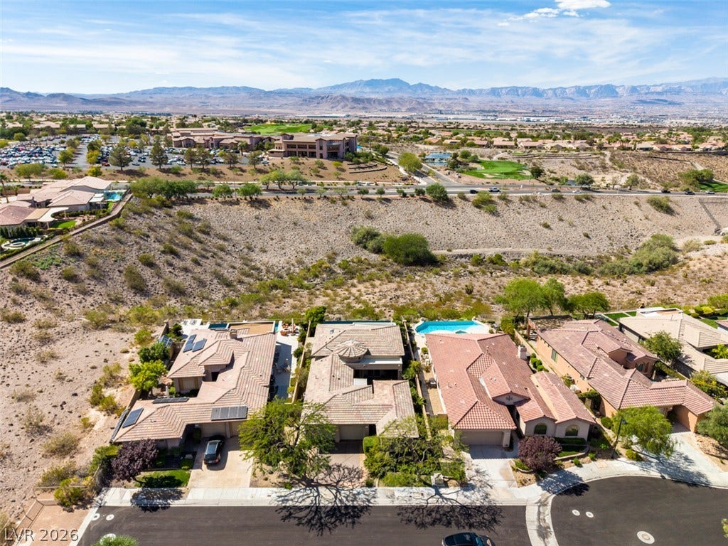 51 E Braelinn Drive, Henderson, NV 89052 Dramatic mountain vistas frame this peaceful desert community nestled along a natural ridge.