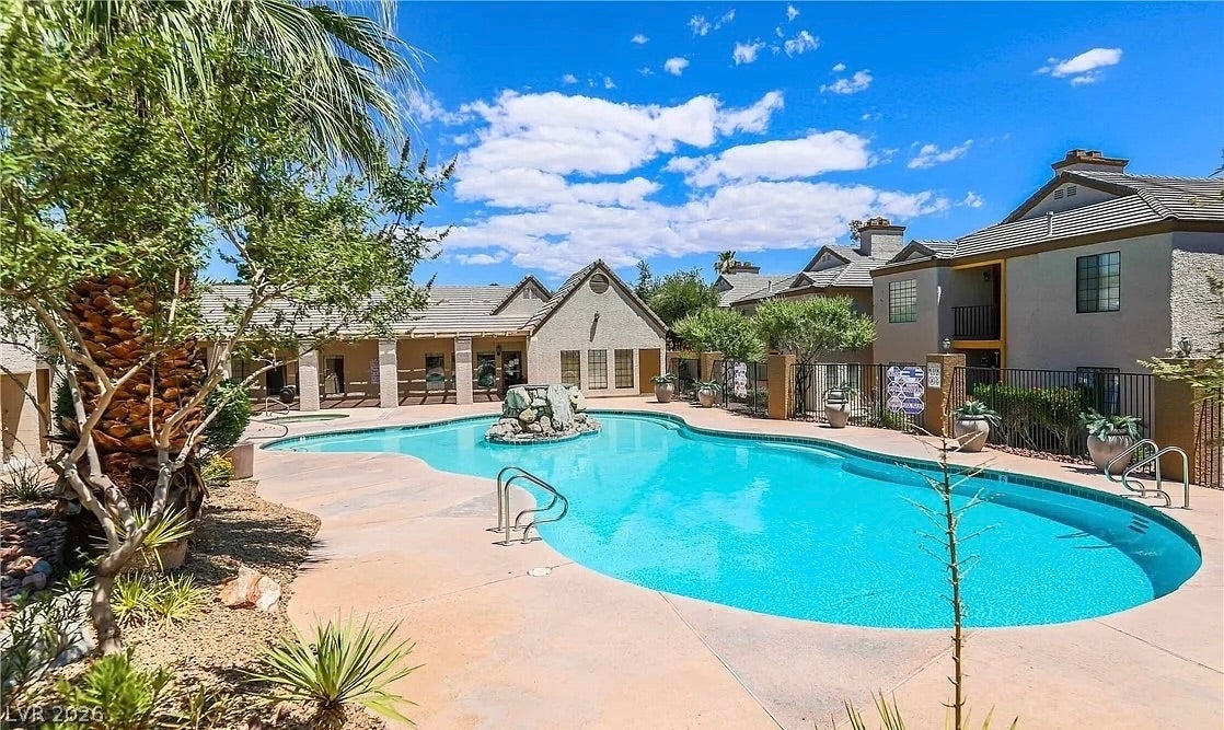 2700 N Rainbow Boulevard, #2137, Las Vegas, NV 89108 A sparkling community swimming pool serves as the centerpiece of this beautifully landscaped courtyard.