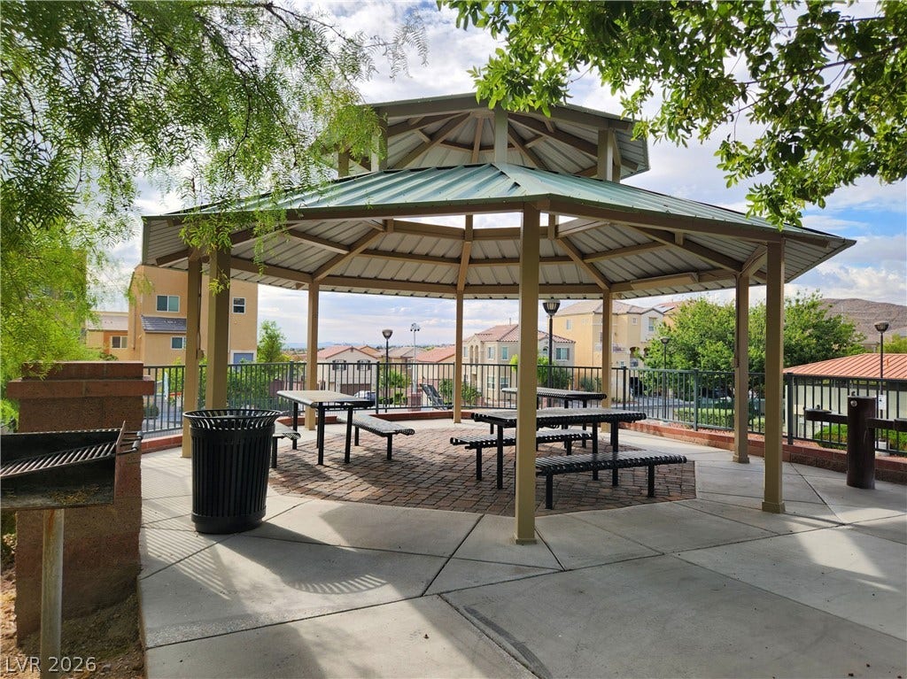 10549 Gibbous Moon Drive, Las Vegas, NV 89129 An inviting covered gazebo picnic area with brick paving overlooks the surrounding neighborhood.
