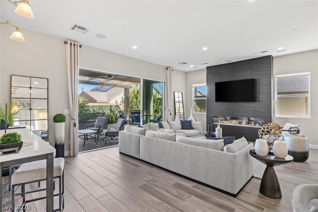 3382 Spring Rock Avenue, Henderson, NV 89044 Sliding glass doors seamlessly connect this modern living space with a covered patio.