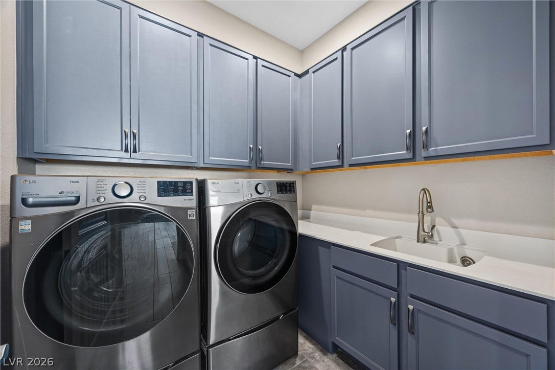 3382 Spring Rock Avenue, Henderson, NV 89044 Ample built-in cabinetry and a convenient utility sink maximize utility in this functional space.