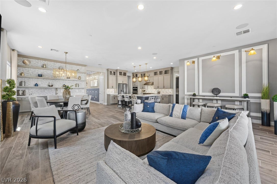 3382 Spring Rock Avenue, Henderson, NV 89044 An open floorplan seamlessly connects the airy living space to the adjacent kitchen and dining area.