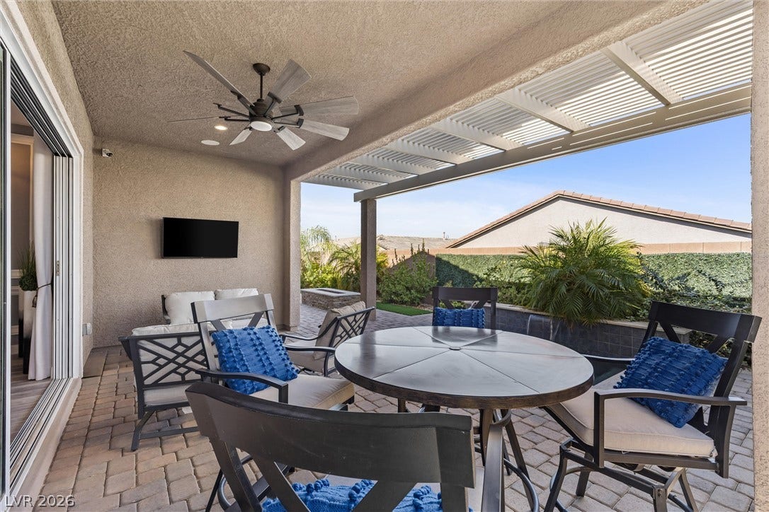 3382 Spring Rock Avenue, Henderson, NV 89044 A shaded patio paved with interlocking pavers overlooks the beautifully landscaped backyard.