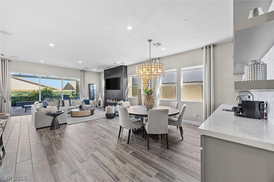 3382 Spring Rock Avenue, Henderson, NV 89044 An open floorplan seamlessly connects the dining space to the living area and outdoor patio.